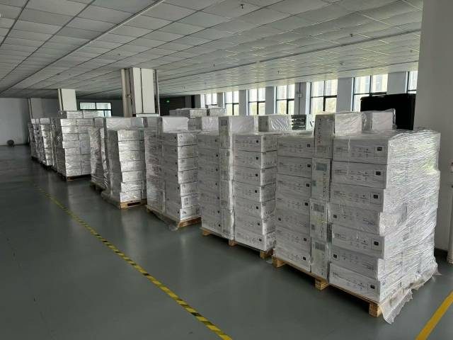Finished inverter units stacked in the dispatch warehouse